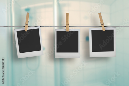 Old film frames blanks on a rope, historical polaroid photo