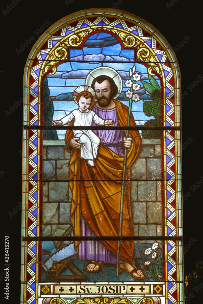 Obraz premium Saint Joseph holding baby Jesus