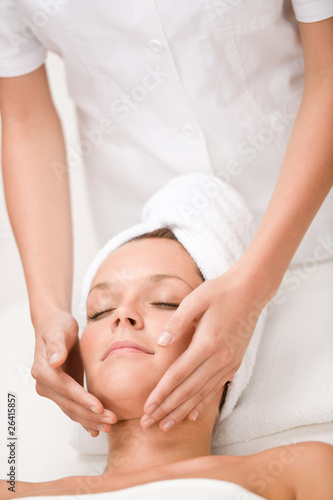 Luxury care - woman at face massage