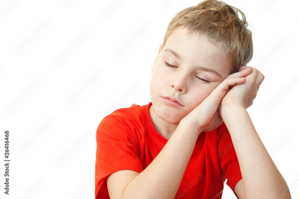 sweet little boy in red sports shirt sleep on his hands sweet little boy in red sports shirt sleep on his hands