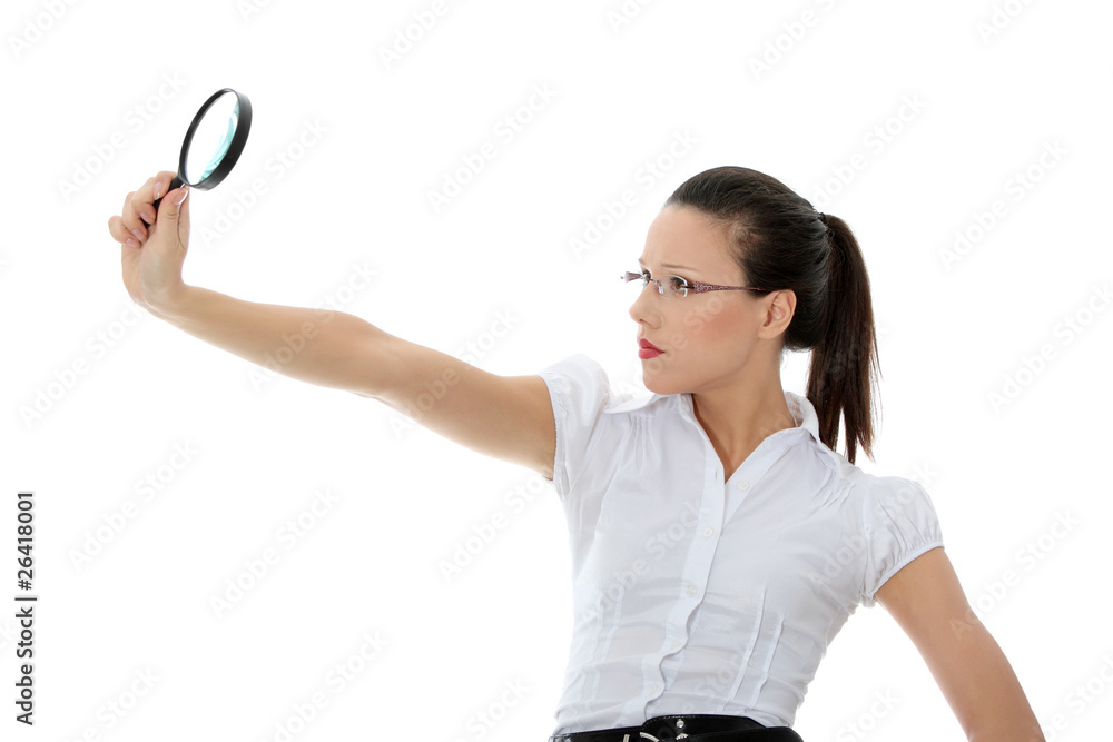 Business woman holding magnifying glass Business woman holding magnifying glass