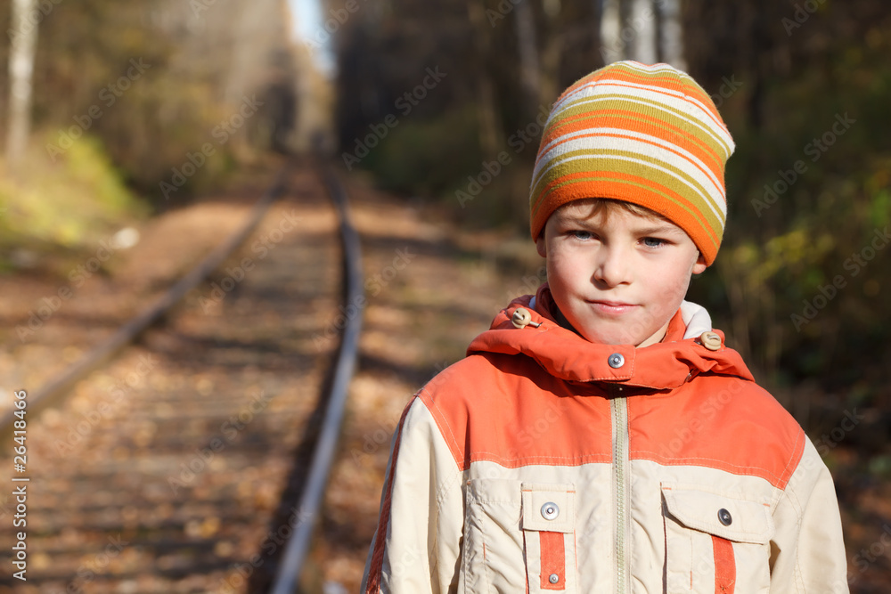 Portrait of boy autumn sunny day on railway. Portrait of boy autumn sunny day on railway.