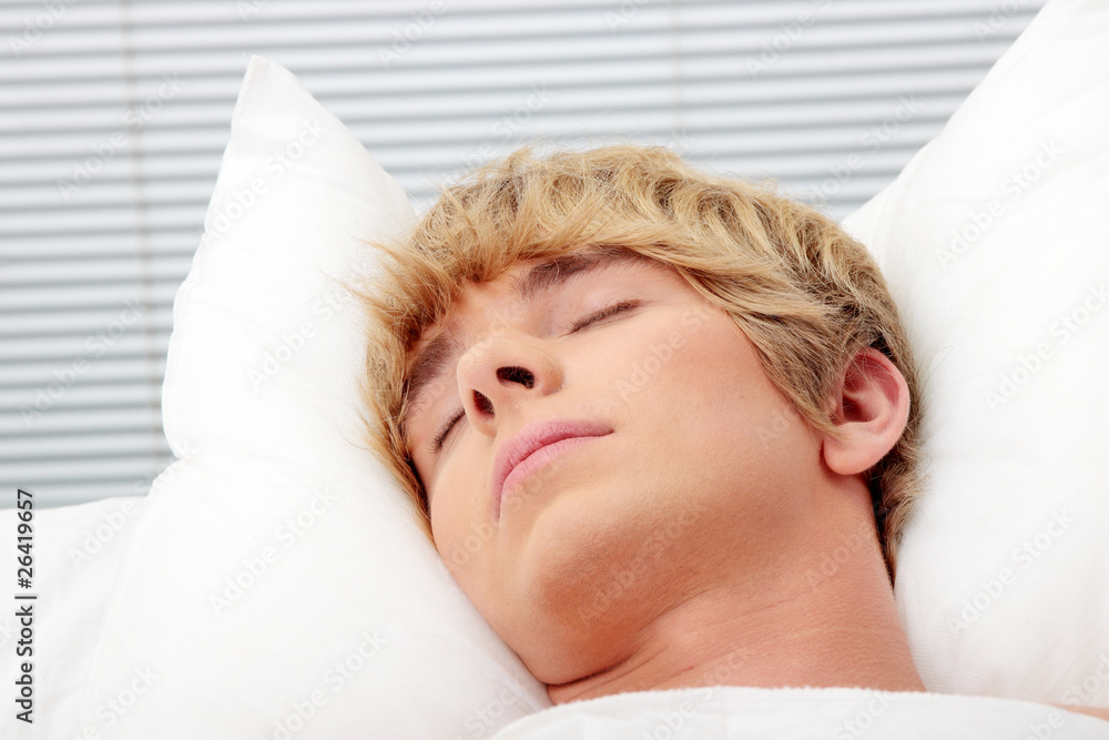 Man sleeping in his bed Man sleeping in his bed