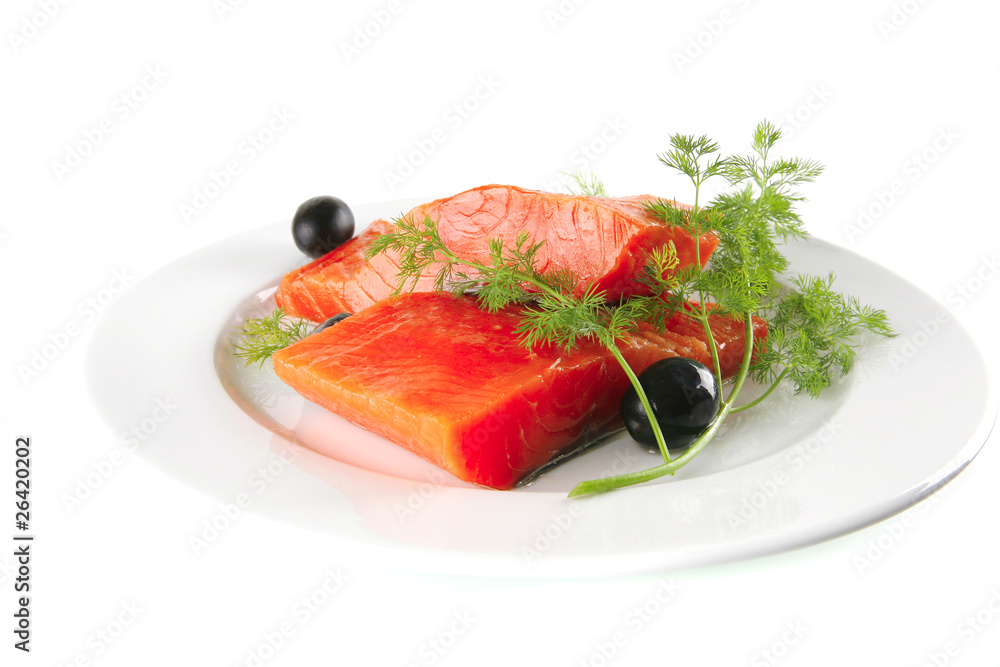 pink salmon on white plate with olives