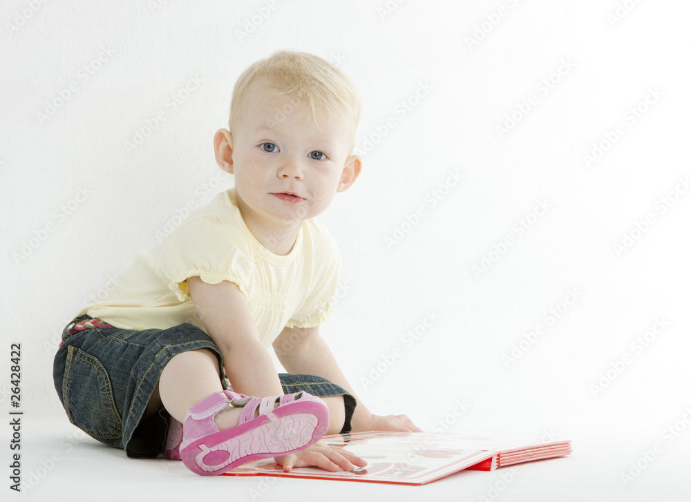 sitting toddler with a book sitting toddler with a book