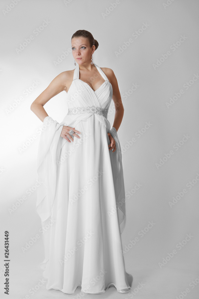Beautiful woman wearing luxurious wedding dress studio Beautiful woman wearing luxurious wedding dress studio
