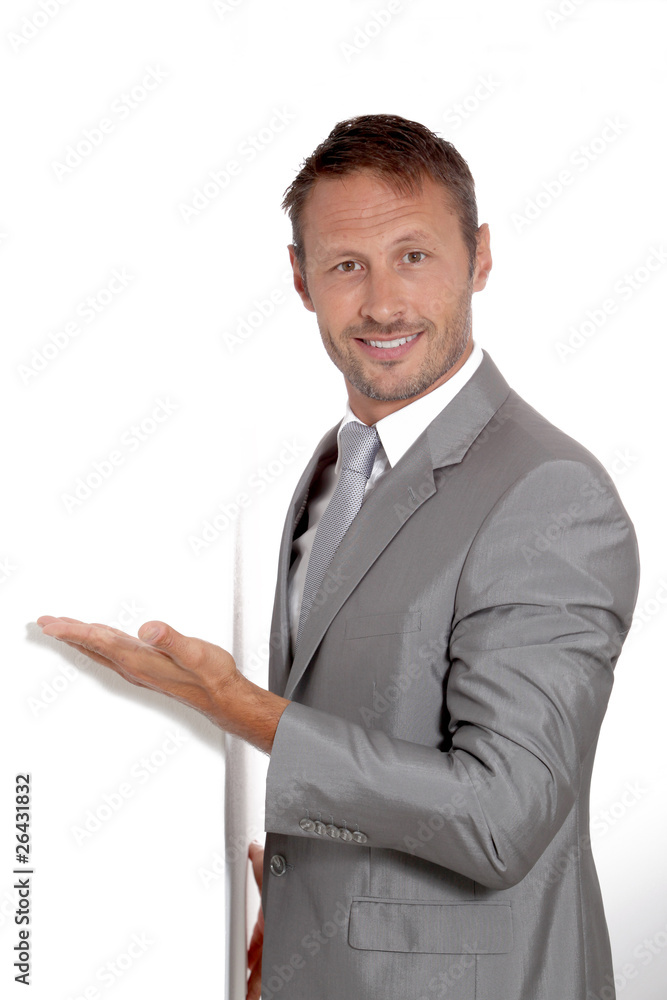 Businessman doing expressions on white background Businessman doing expressions on white background