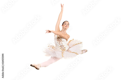 Ballerina wearing white ballet dress in jump isolated on white