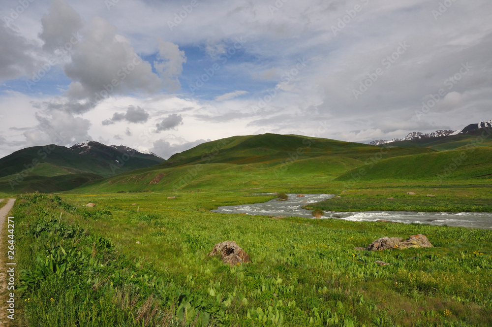 Fototapeta premium Colorful mountains with sky and clouds
