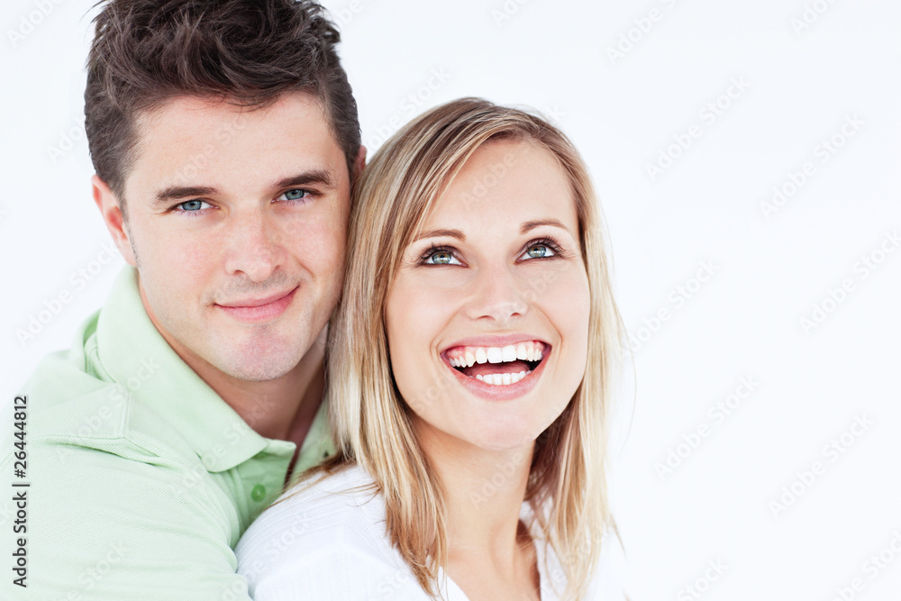 Young beautiful couple man looking at the camera Young beautiful couple man looking at the camera