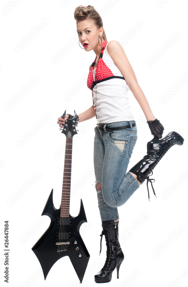 Young rock woman with electric guitar
