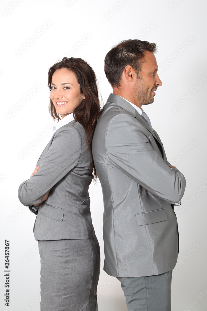 Business partners standing on white background Business partners standing on white background