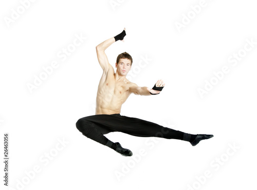 acrobat dancer jumping over white