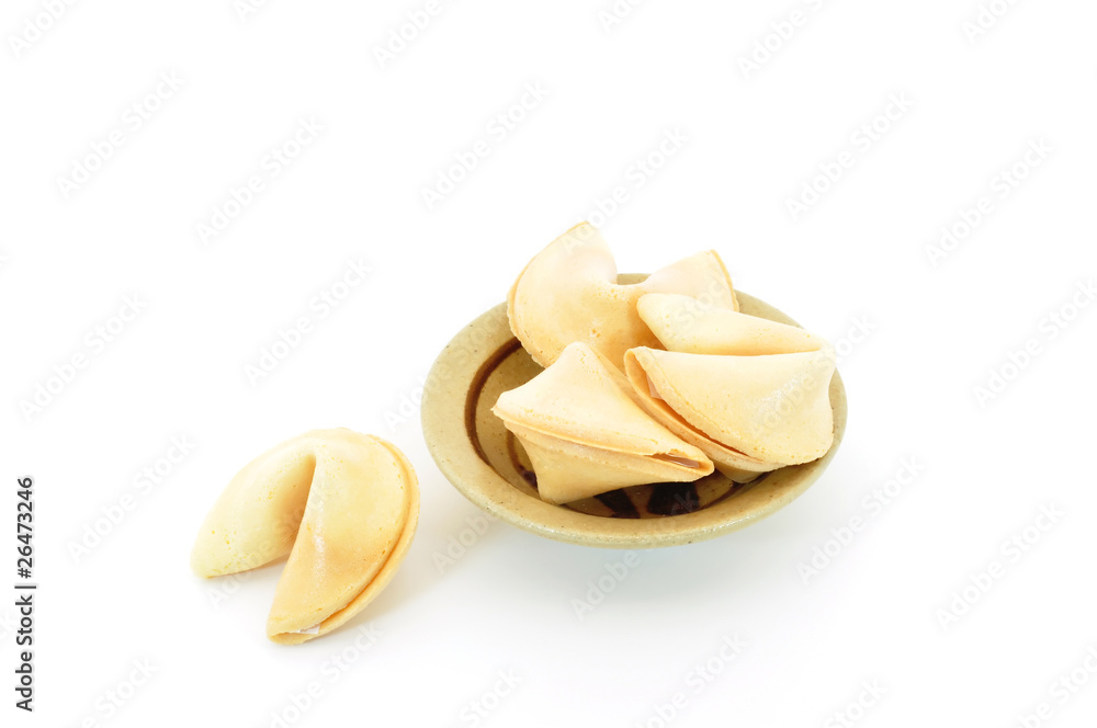 looking down on fortune cookies in small ceramic bowl looking down on fortune cookies in small ceramic bowl