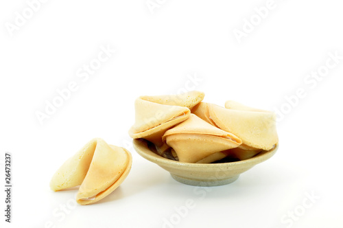 fortune cookies in small ceramic bowl isolated on white
