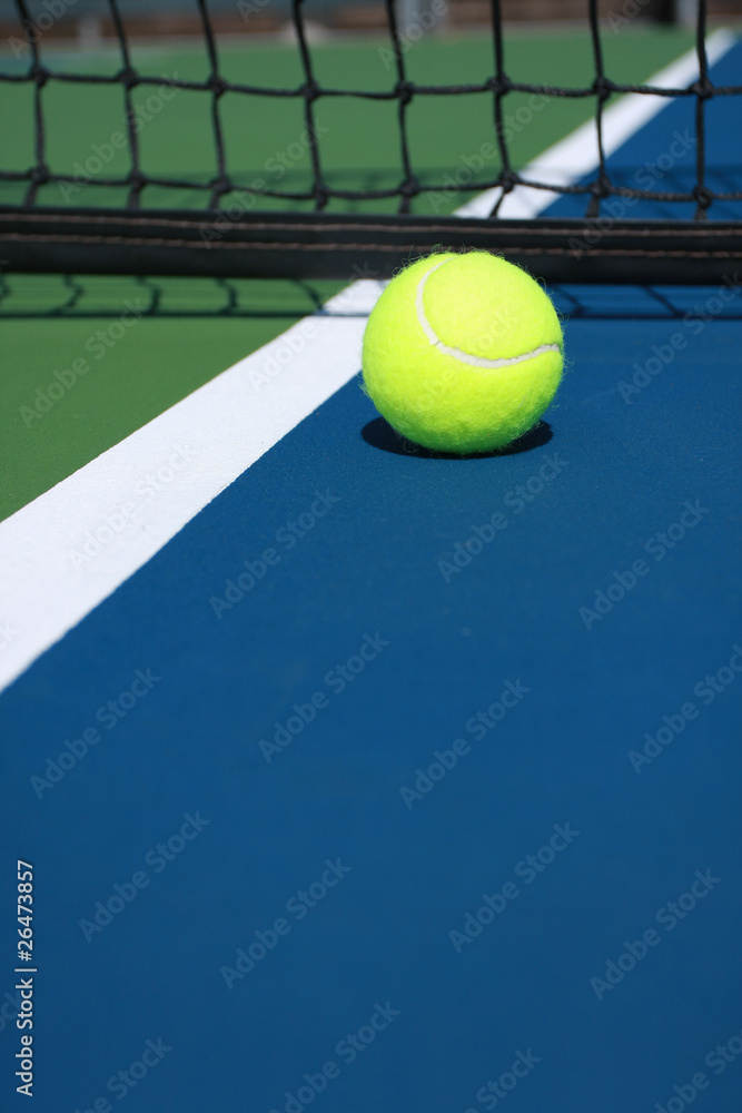 Tennis ball close to the net