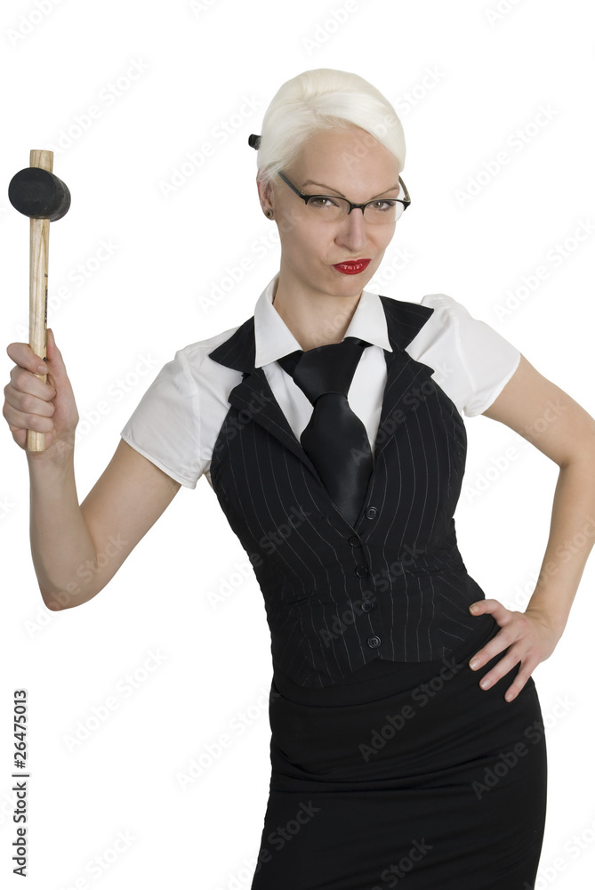 Young business woman with a hammer in her hand Young business woman with a hammer in her hand