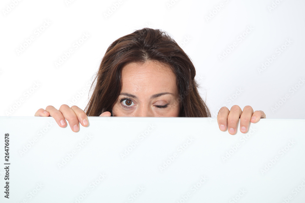 Woman showing white board on white background Woman showing white board on white background