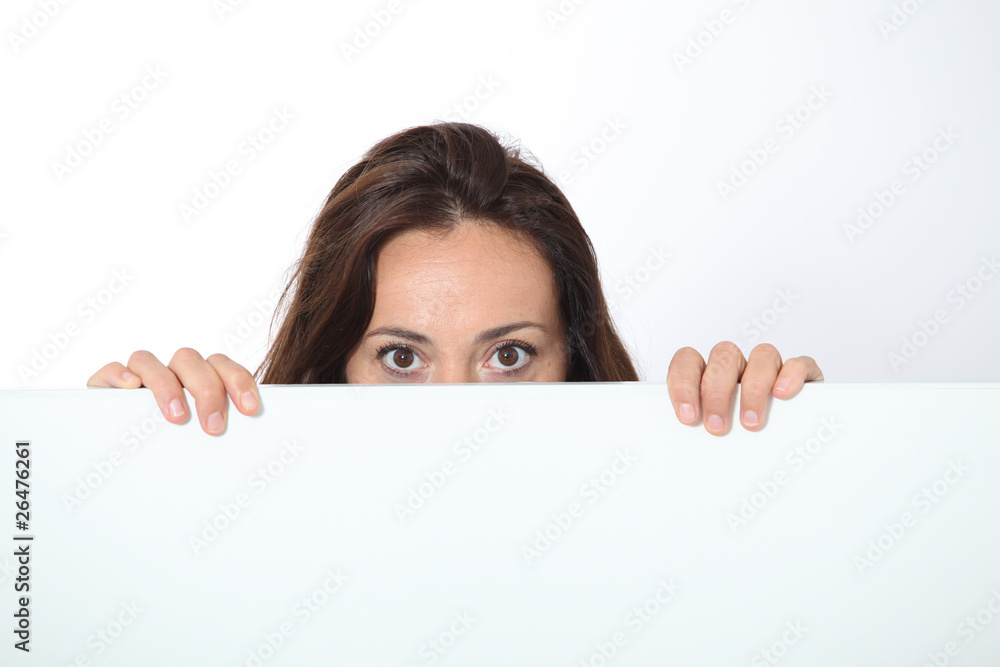 Woman showing white board on white background Woman showing white board on white background