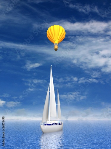 Sailing luxury yacht and flying balloon