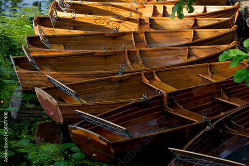 rowing boats tied up in Dedham in Constable Country, England photo