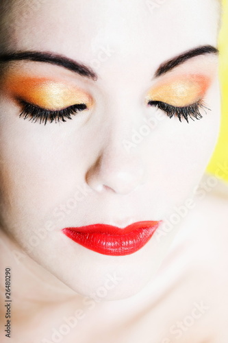 Woman Beauty eyes closed with colorful make up  portrait