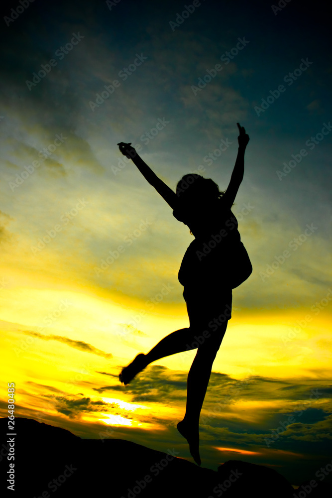 A woman jumping A woman jumping