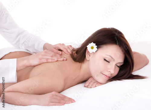 Beautiful young woman having massage.