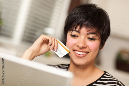 Smiling Multiethnic Woman H...