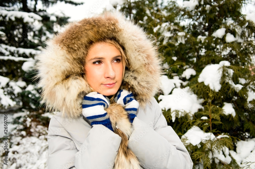 portrait of young woman in winter forest portrait of young woman in winter forest
