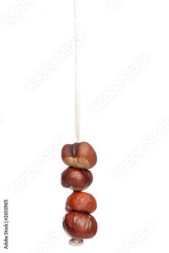 Four conkers on a string