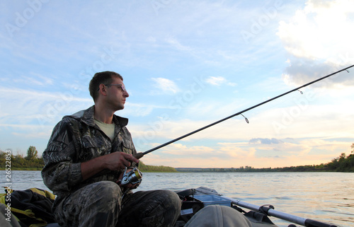 men fishing with spinning