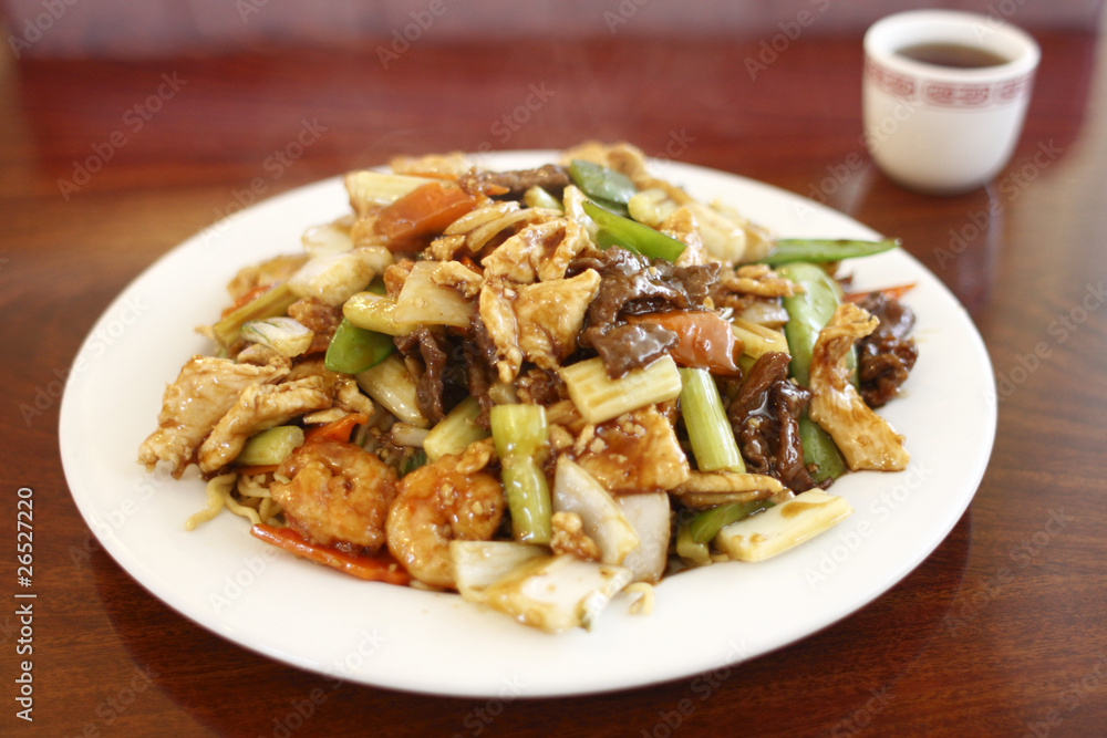 Plate of Chinese food with meat and vegetables Plate of Chinese food with meat and vegetables