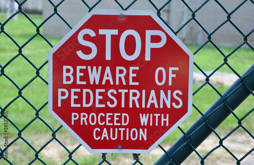 Pedestrian walking stop sign