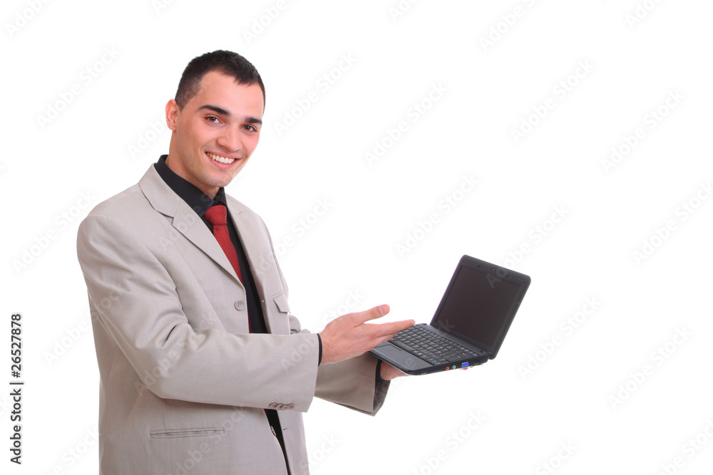 young business man standing with laptop