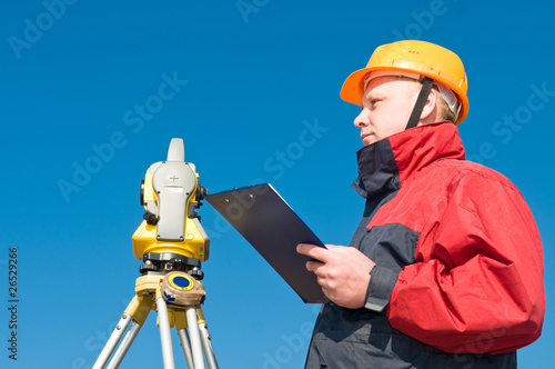 surveyor theodolite worker