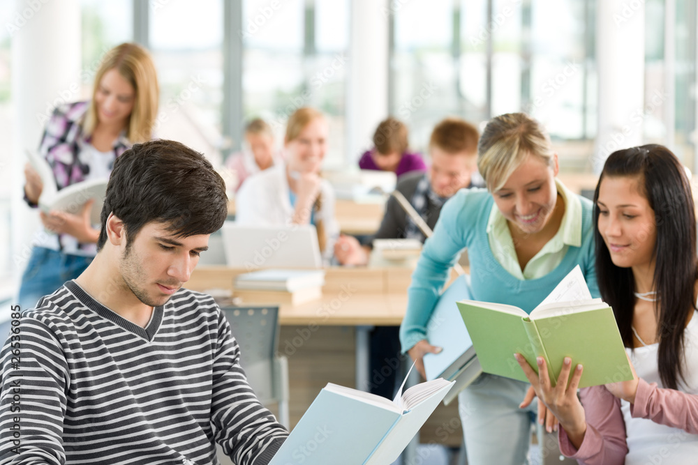 High school - three students with book High school - three students with book