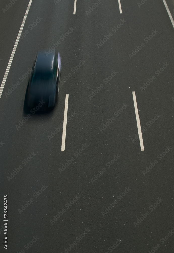 view of highway asphalt with traffic