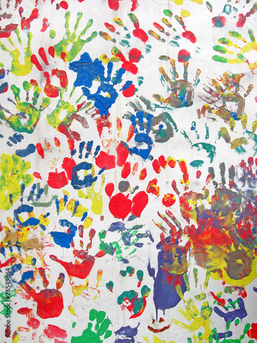 color hands on wall, handprint heap diversity background