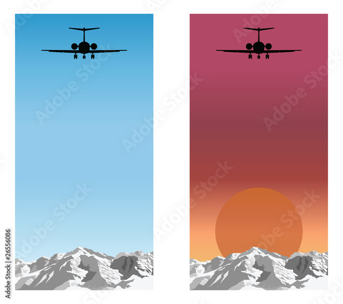 Airplane flying over mountain range blue sky and sunrise