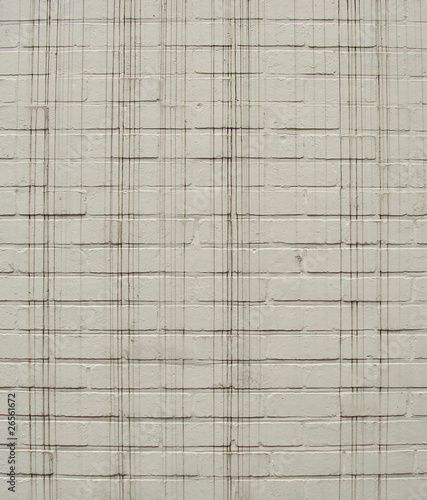 Wallpaper Mural white painted brick wall with long thin black drips Torontodigital.ca