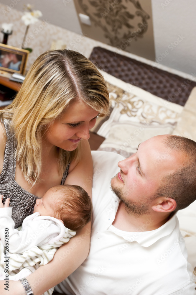 Young couple with newborn