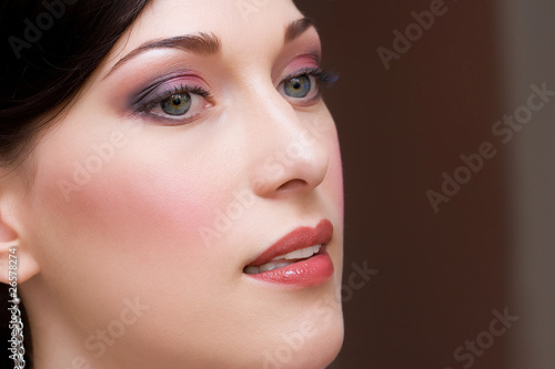 closeup make up of beautiful brunette young lady