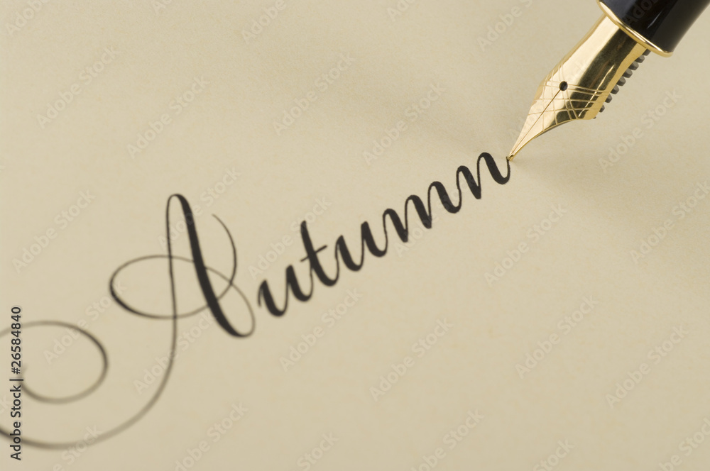 Fototapeta premium Inscription Autumn with gold pen