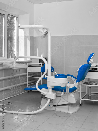 Dentist office with blue chair