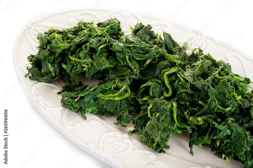 boiled spinach on dish-spinaci bolliti boiled spinach on dish-spinaci bolliti