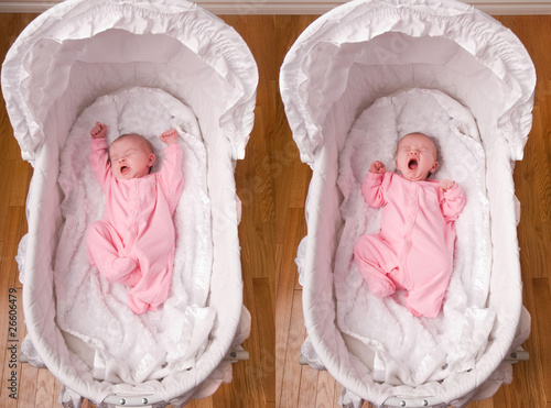 Obraz na plátně Newborn Baby Girl Yawning in Bassinet