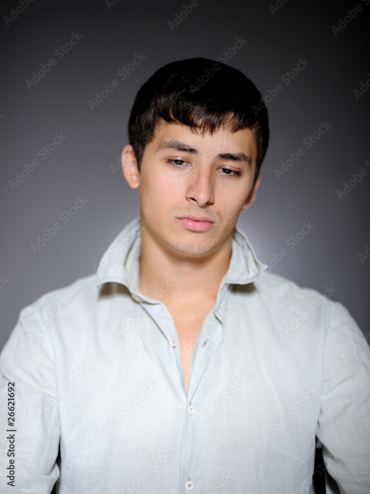 Expressions. Handsome man in white shirt feeling sad and depress Expressions. Handsome man in white shirt feeling sad and depress