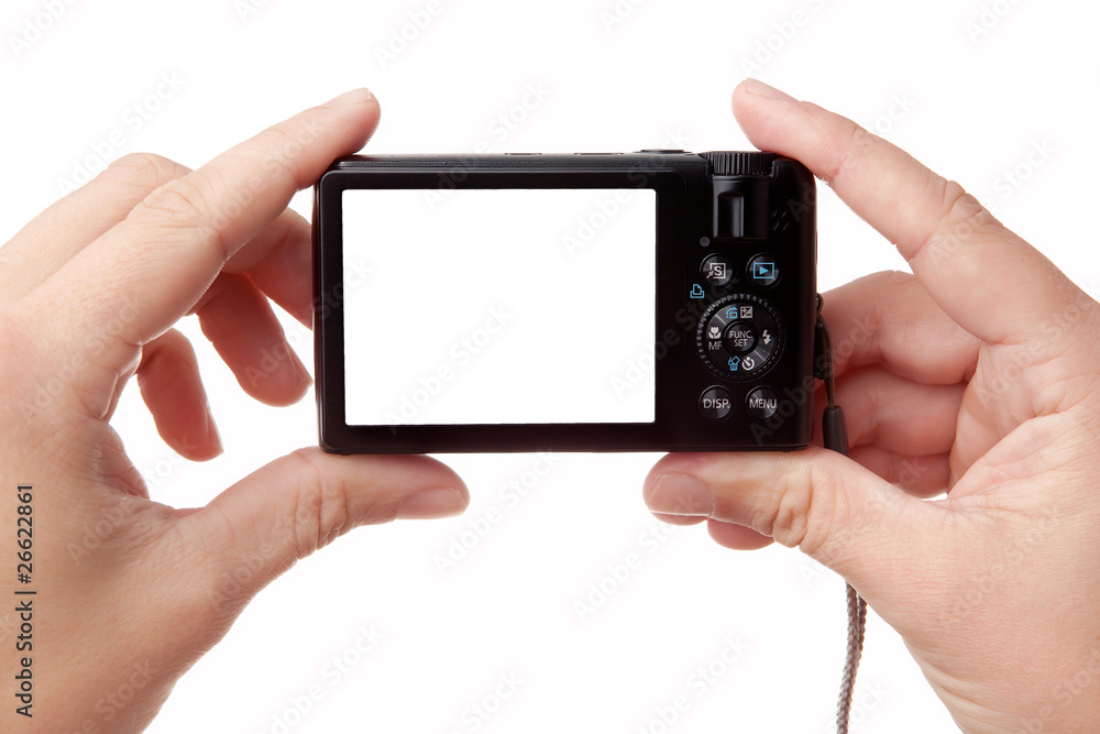 Hands holding digital photo camera