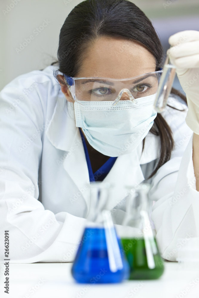 Female Scientist or Woman Doctor With Test Tube In Laboratory Female Scientist or Woman Doctor With Test Tube In Laboratory